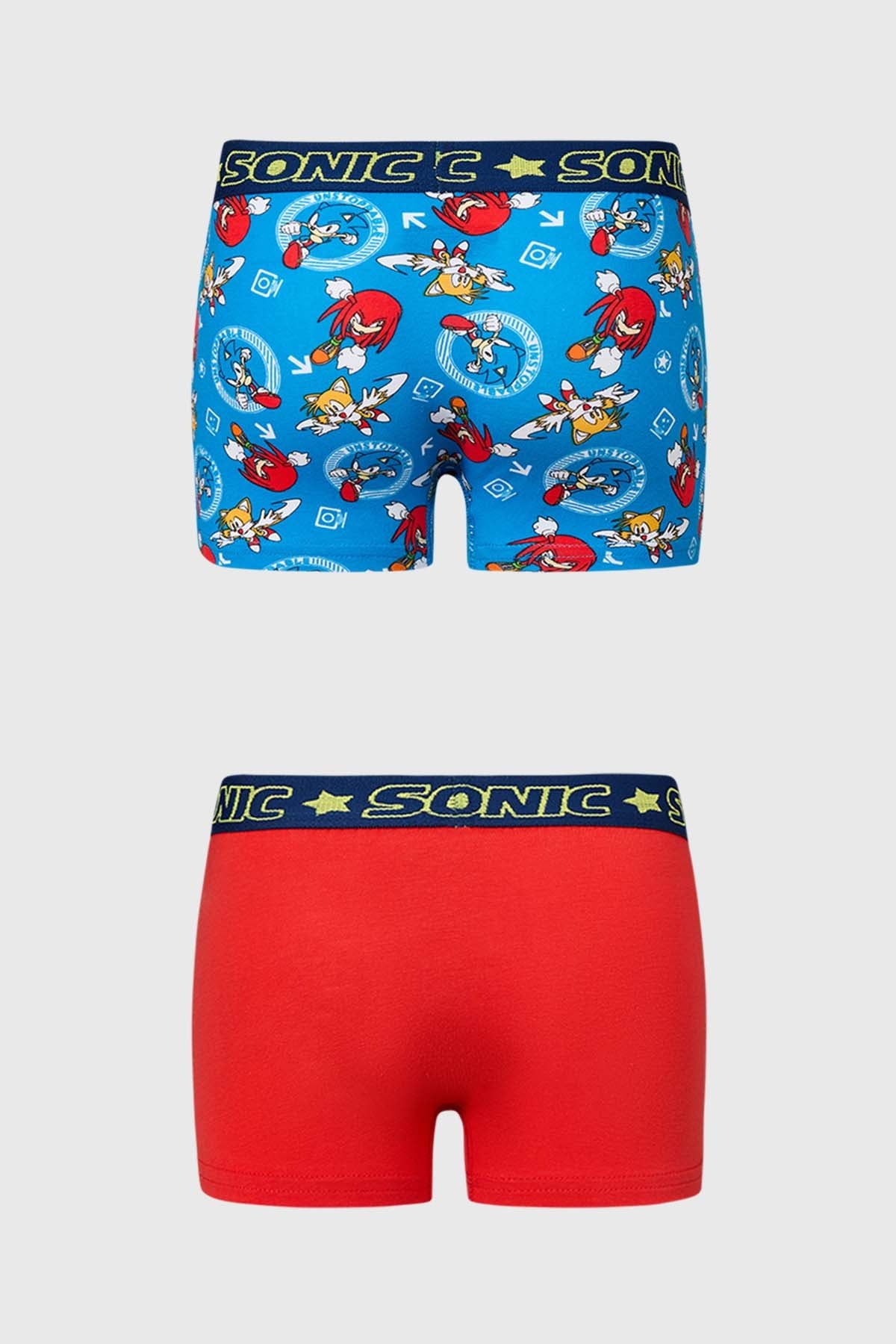 Bóxer tripack Sonic en azul y rojo con estampados vibrantes de Sonic y amigos, perfecto para fans del icónico videojuego.