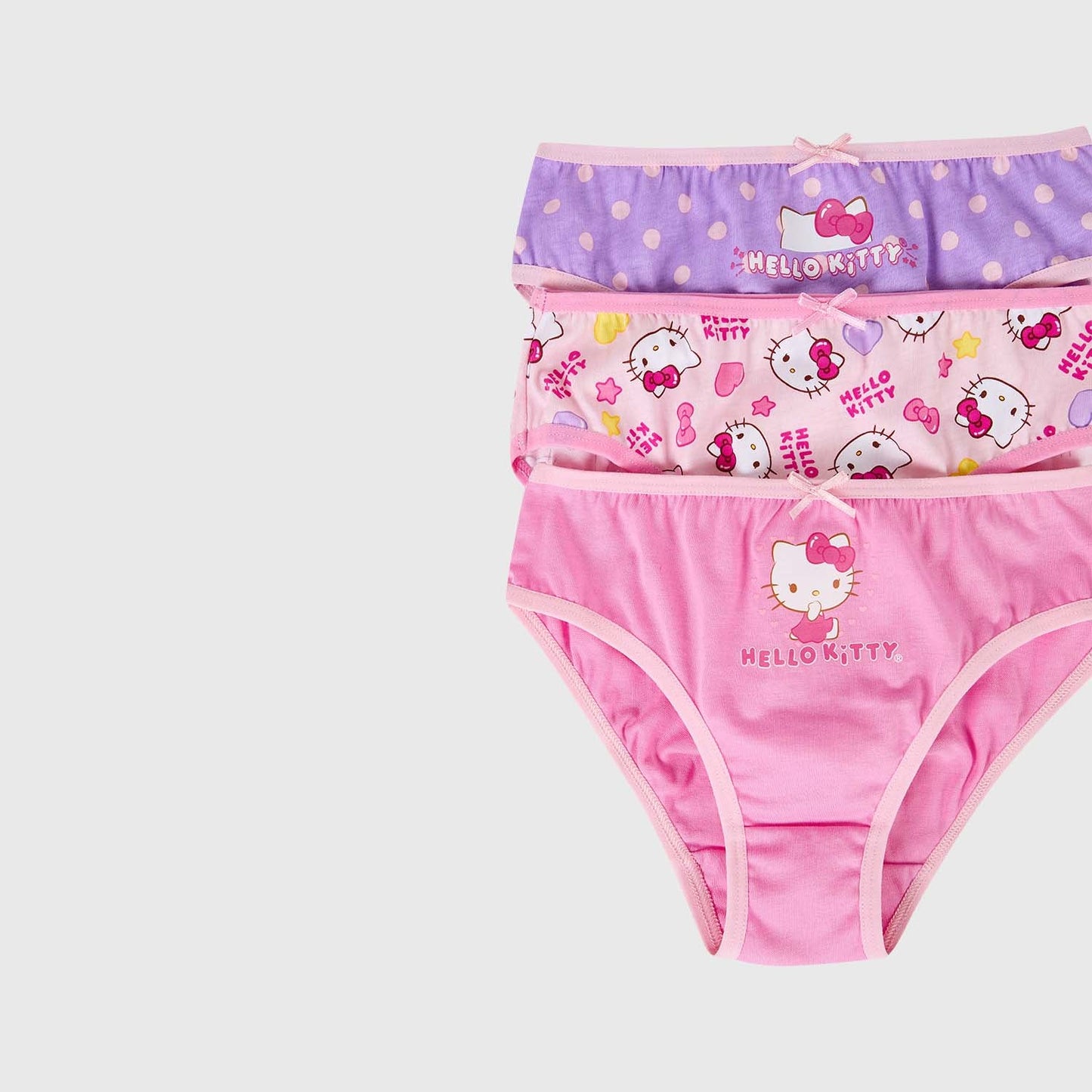 Calzón tripack de Hello Kitty en tonos lilas y rosas, con estampados de la icónica gatita en diferentes poses, ideal para fans de Sanrio.