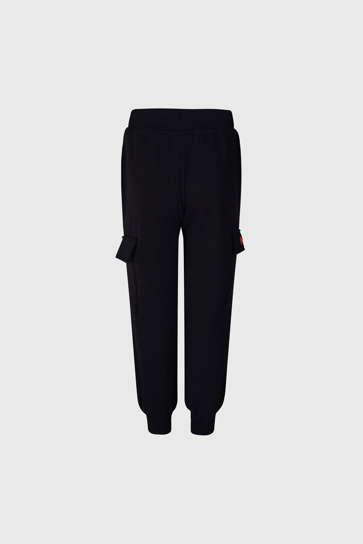 Pantalón buzo negro con estampado de Minnie Mouse en colores vibrantes, detalles de estilo urbano y bolsillos laterales, ideal para fans de Disney.