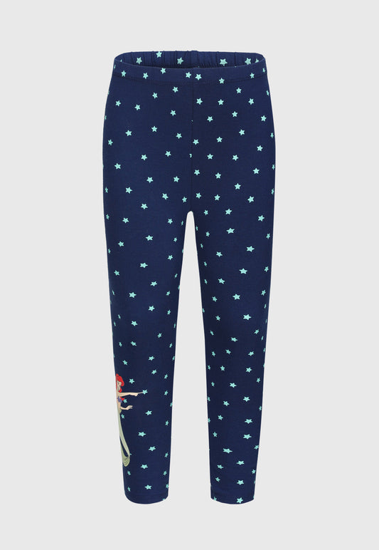 Calza azul marino con estampado de estrellas celestes y diseño de Ariel, la sirenita, en acción sobre la pierna izquierda, perfecta para fans de Disney.