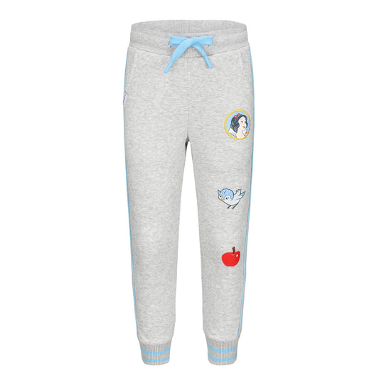 Pantalón buzo crudo melange con detalles de Blanca Nieves, incluyendo su rostro, un pájaro volando y una manzana roja, ideal para fans de Disney.