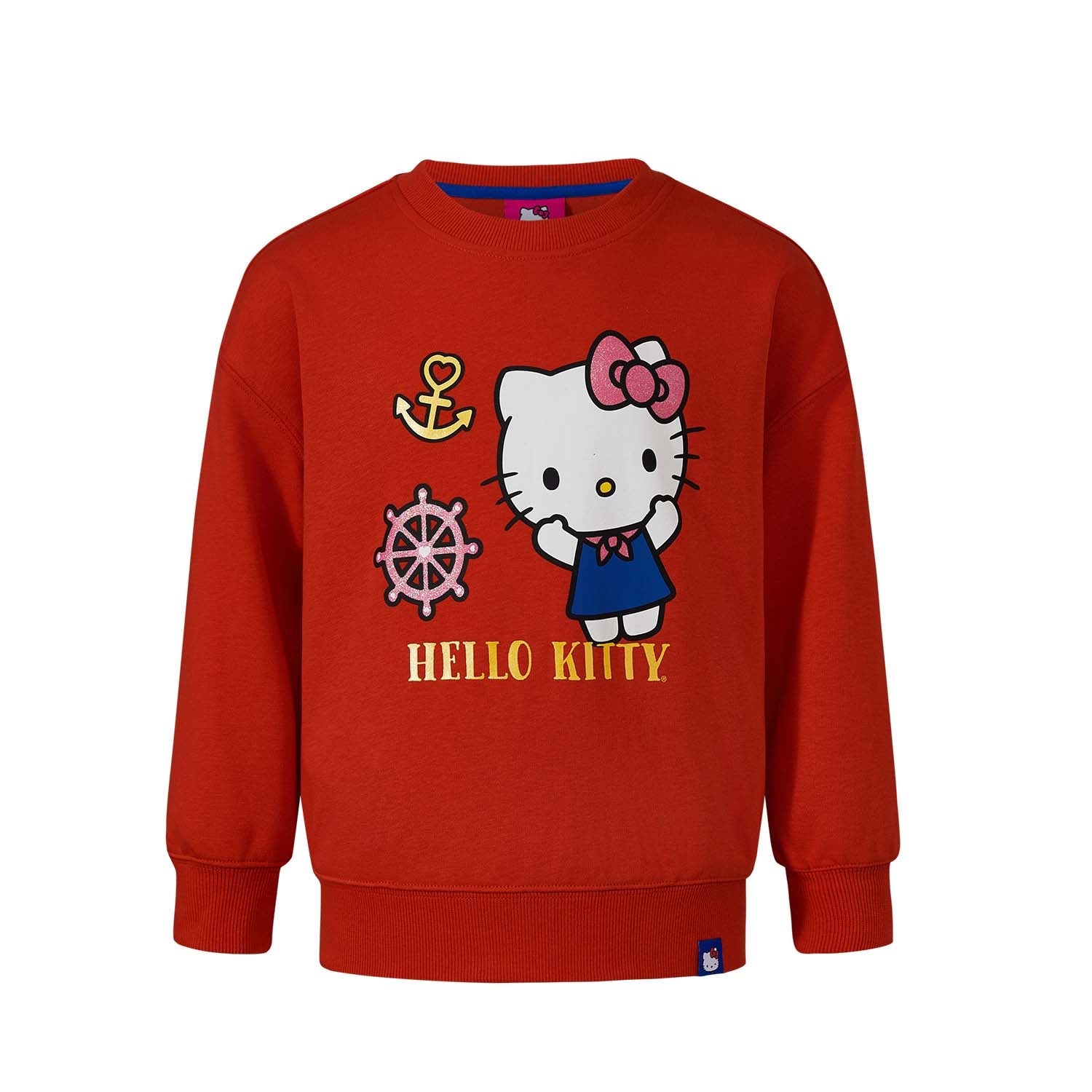 Polerón rojo de Hello Kitty con ilustración de la icónica gatita en vestido azul y moño rosa, acompañada de un ancla y timón, ideal para fans.