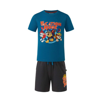 Pijama de Paw Patrol en azul vibrante con estampado de Chase, Marshall y Rubble en modo vacaciones, shorts gris oscuro con logo, ideal para fans.