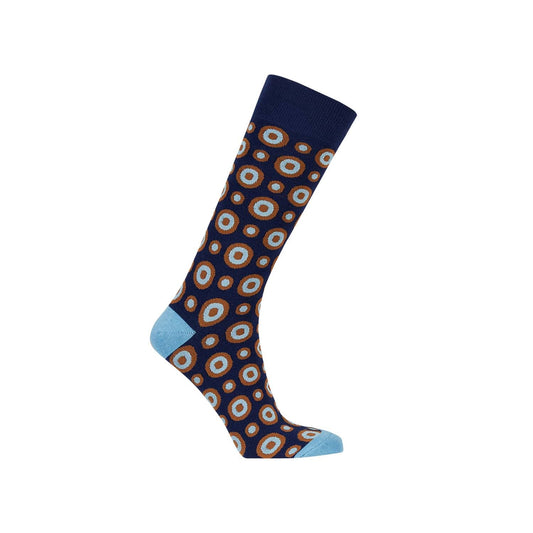 Calcetín de vestir azul marino con un vibrante diseño de círculos en tonos terracota y celeste, ideal para expresar tu estilo único.