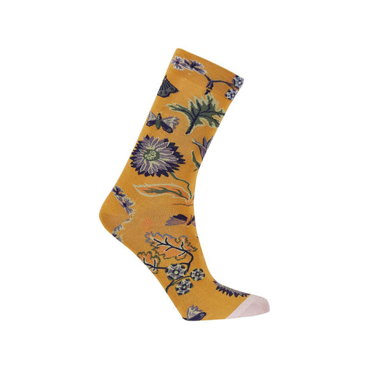 Calcetín de vestir naranjo con estampado floral en tonos morados y verdes, ideal para los amantes de la moda que buscan un toque vibrante y original.