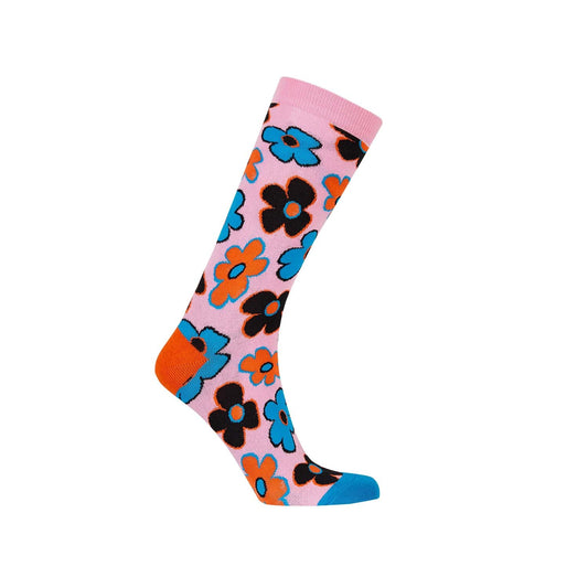 Calcetín de vestir rosado con estampado floral vibrante en azul, negro y naranja, ideal para mostrar tu estilo único y divertido.