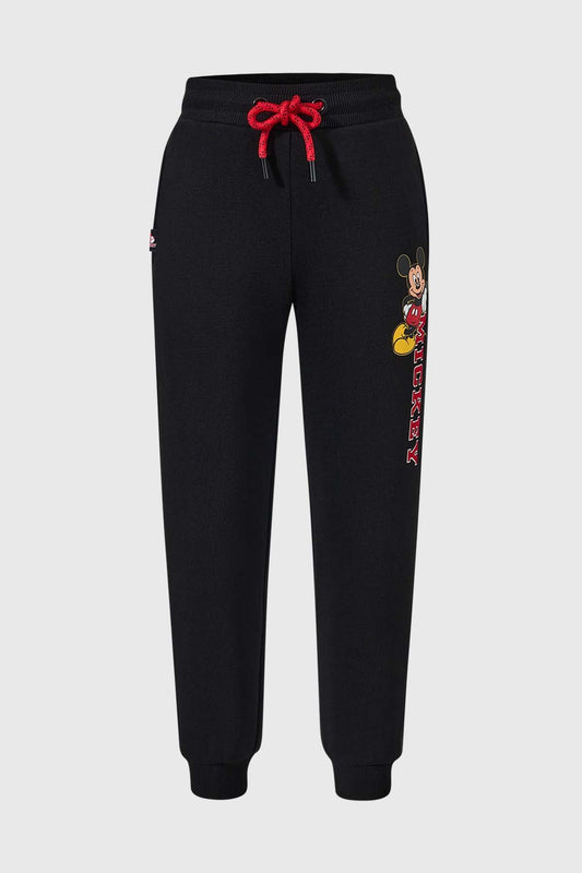 Pantalón buzo negro con detalles de Mickey Mouse en colorido estampado a un lado y cordones rojos, ideal para los fans de Disney.