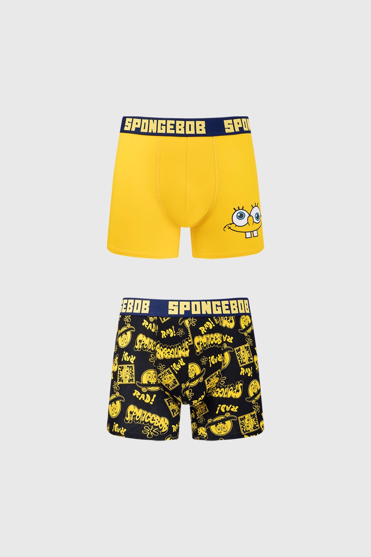 Bóxer amarillo de Bob Esponja con un diseño frontal de su cara y estampado negro con frases icónicas, ideal para fanáticos de Nickelodeon.