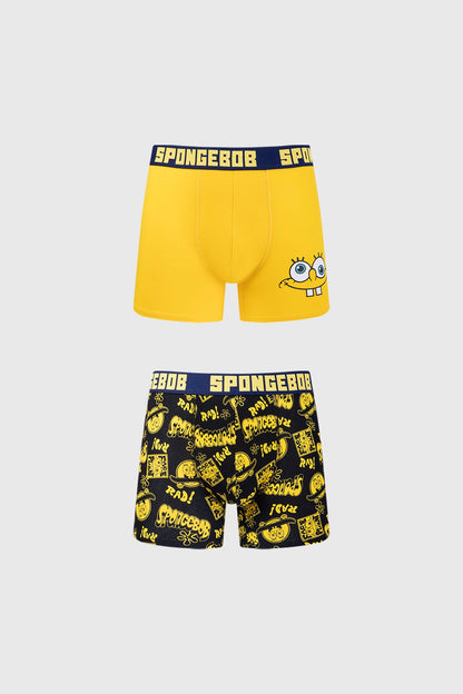 Bóxer amarillo de Bob Esponja con un diseño frontal de su cara y estampado negro con frases icónicas, ideal para fanáticos de Nickelodeon.
