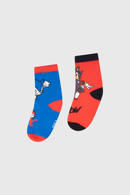Calcetín bipack en azul y rojo con estampados de Sonic y Shadow, personajes icónicos de Sega, ideal para fans del universo de videojuegos.