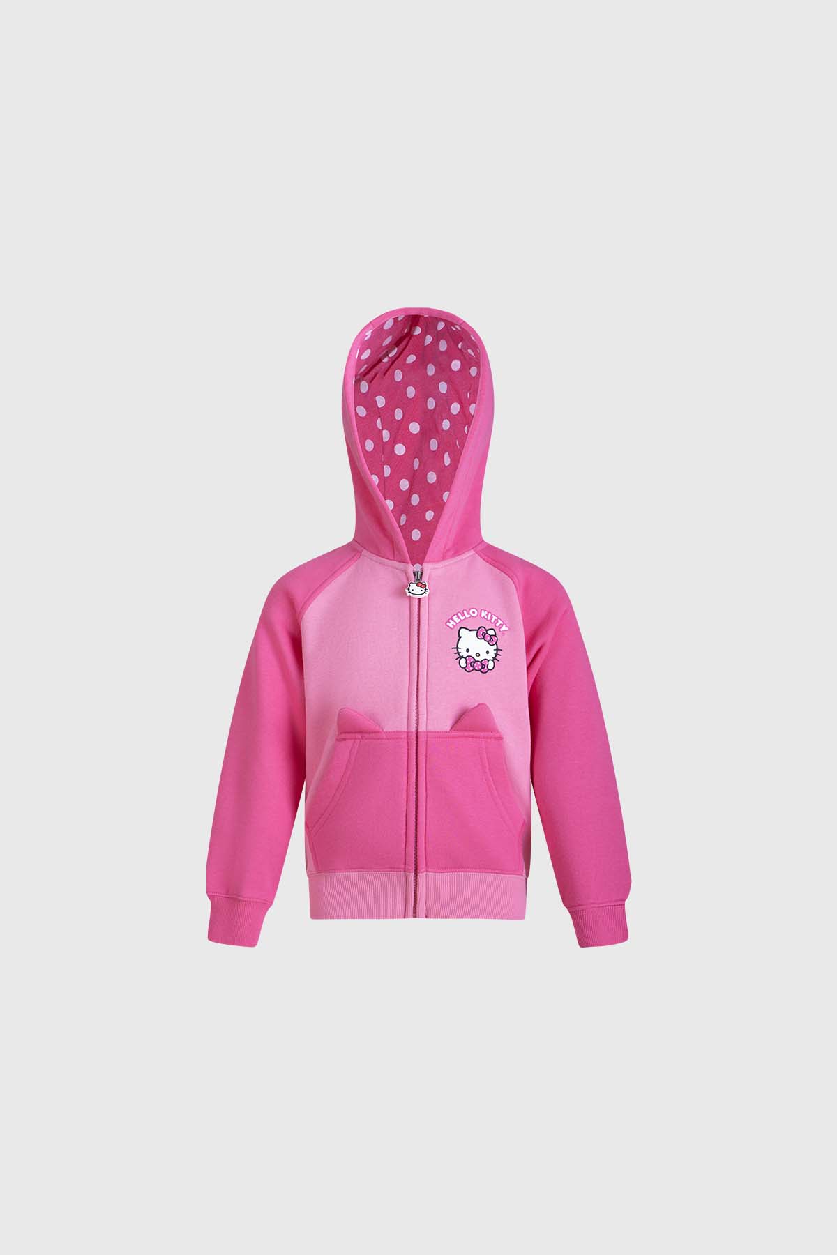Polerón rosado con capucha y estampado de Hello Kitty en el pecho, interior con puntos, ideal para fans de la icónica gatita de Sanrio.