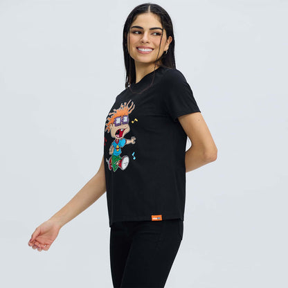 Polera negra de algodón con estampado colorido de Carlitos de Rugrats, mostrando su característico peinado y expresión divertida, ideal para fans de la serie.