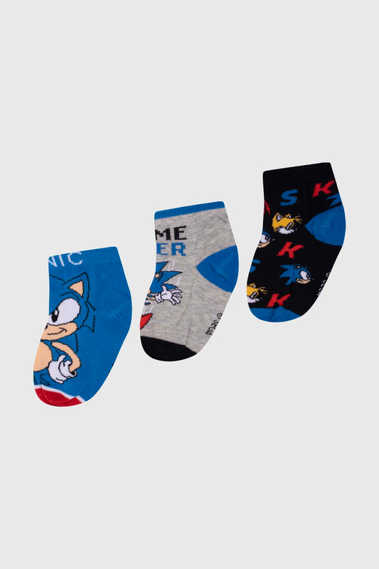 Tripack de calcetas Sonic en azul, gris y negro con ilustraciones del icónico erizo y su compañero Tails, perfectas para los fans de Sega.