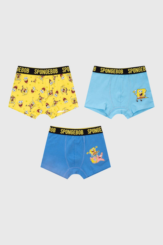 Boxer tripack de Bob Esponja en amarillo y azul con estampados divertidos del personaje en acción, ideal para los fanáticos de Nickelodeon.
