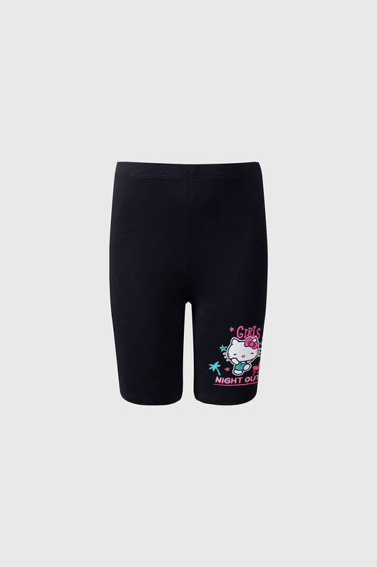 Calza negra de Hello Kitty con estampado colorido que muestra a la icónica gatita en un divertido diseño de "Girls Night Out" resaltando su espíritu juguetón.