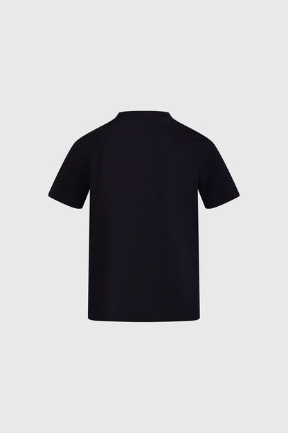 Polera negra de Dragon Ball con Vegeta en su forma Super Saiyan Blue, mostrando una pose desafiante, con el logo de la serie en azul debajo.