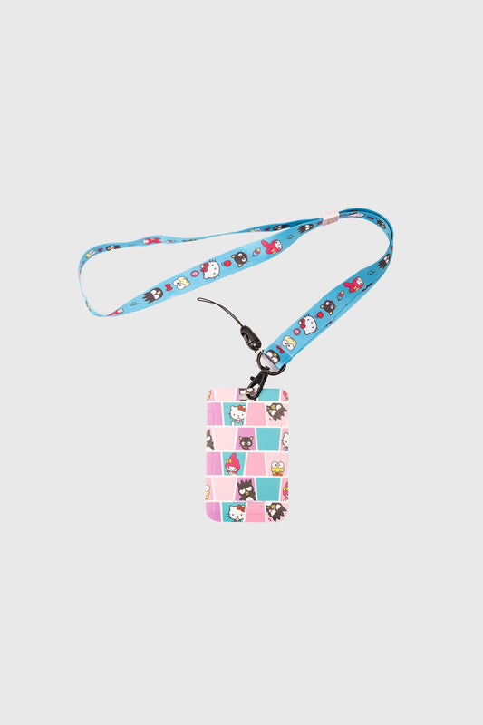 Lanyard turquesa con estampado de Hello Kitty y amigos en colores pastel, ideal para llevar tus credenciales con estilo y amor por el universo Sanrio.