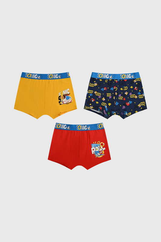 Boxer tripack Sonic en amarillo, rojo y azul marino con estampados icónicos del erizo más rápido del mundo y frases divertidas, ideal para fans de Sega.