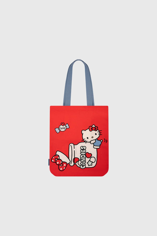 Bolsa roja de Hello Kitty con un diseño encantador que muestra a la icónica gatita junto a un frasco de caramelos, resaltando su característico lazo y una expresión juguetona.