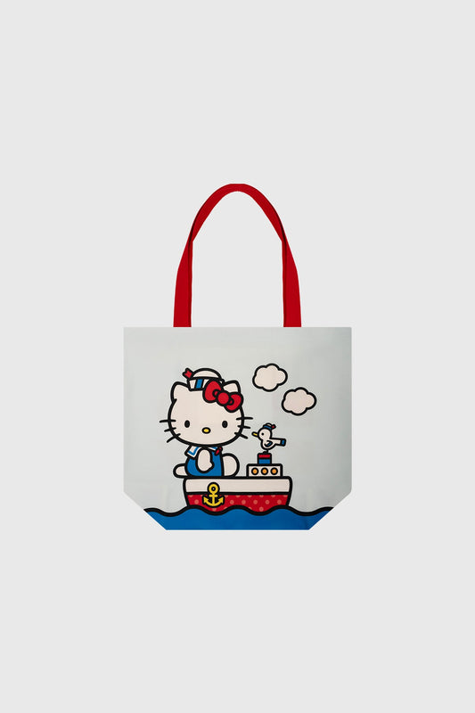 Bolsa celeste de Hello Kitty con un diseño divertido que muestra a Kitty en un barco, usando un gorro de marinero y rodeada de olas y nubes.