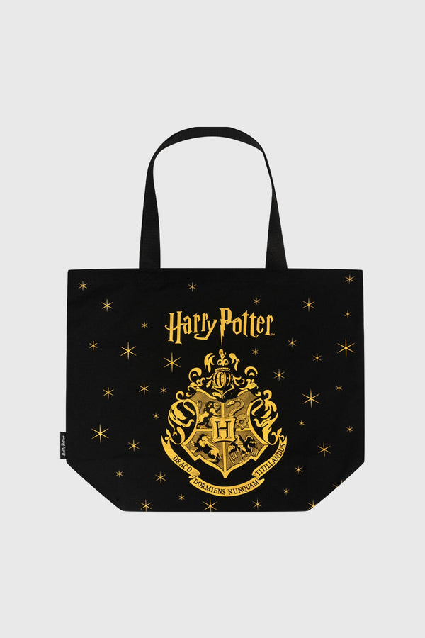 Bolsa negra de Harry Potter con estampado dorado del escudo de Hogwarts y estrellas, ideal para mostrar tu pasión por el mundo mágico.