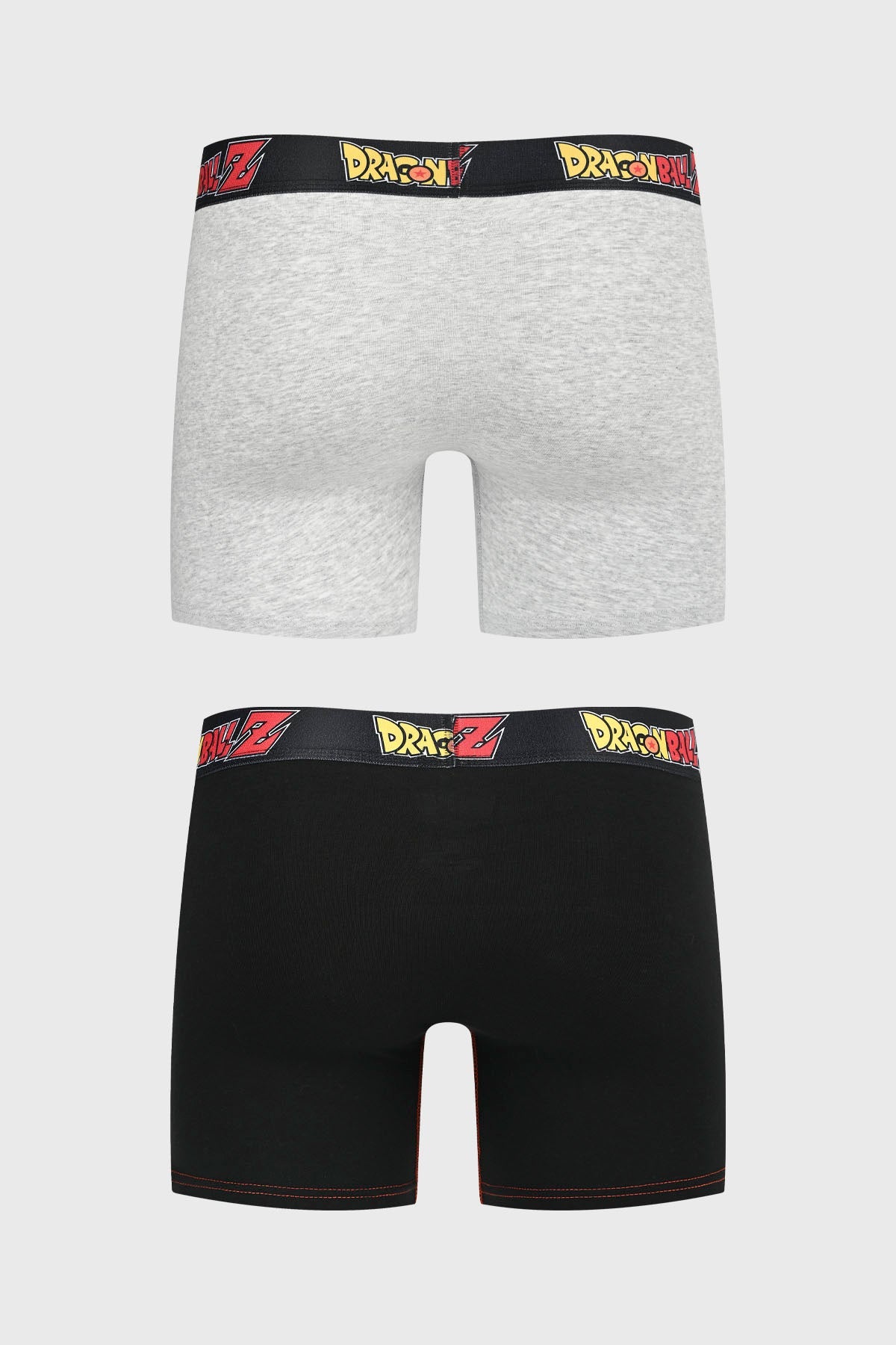 Boxer bipack de Dragon Ball Z en gris y negro con estampados de Goku, el primero en acción y el segundo con su icónico traje naranja, ambos con cinturilla de logo.