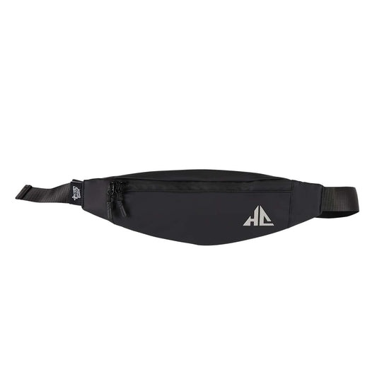 Banano outdoor slim negro de poliuretano con logo plateado de Holly Concept, diseño minimalista ideal para aventuras urbanas y festivales.